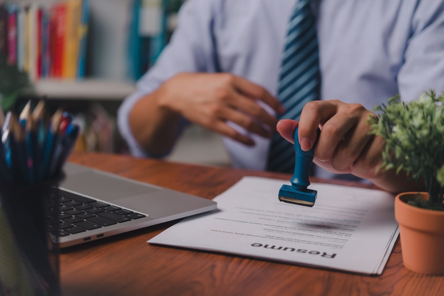 Employment contract being stamped and approved