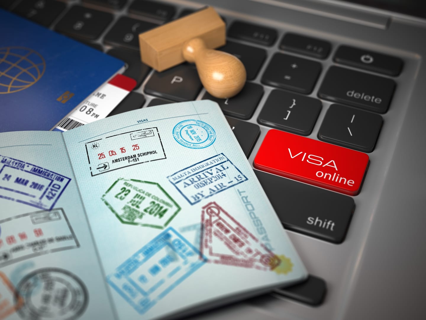 Open passport with a visa on a desk