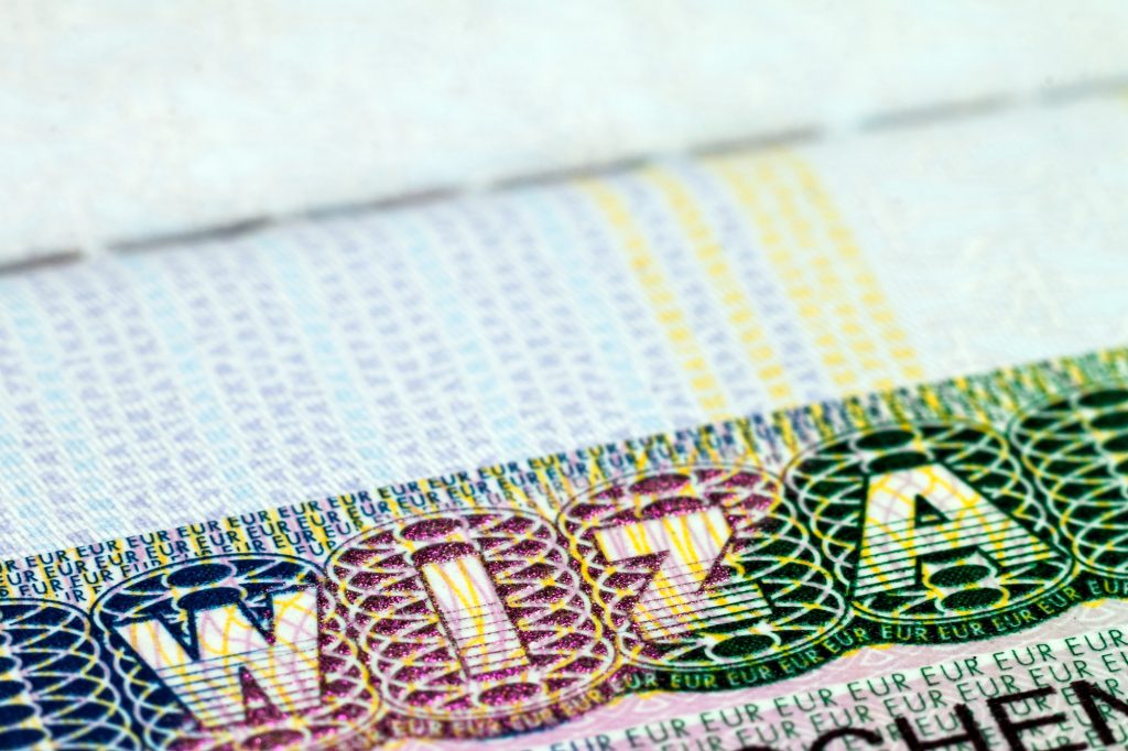 Close up of visa in passport. Poland of shengen travel concept.