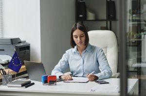 Visa service employee working with visa documents
